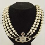 A VIVIENNE WESTWOOD SIMULATED DIAMOND AND PEARL NECKLACE having three rows and central pendant, 80cm