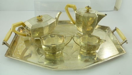 EDWARD VINER LIMITED A GEORGE V ART DECO INFLUENCED SILVER FOUR-PIECE TEA SET AND MATCHING TRAY,