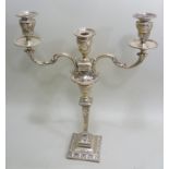 A SILVER PLATED CANDELABRA OF ADAM DESIGN, having three swagged urn sconces on two branches, this