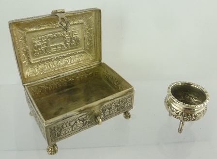 AN EASTERN WHITE METAL CASKET with chased landscape decoration, having hinged cover with swan neck - Image 2 of 3
