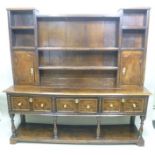 AN 18TH CENTURY DRESSER BASE, fitted three drawers with half bobbin decoration, fitted brass knob