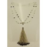 A 1930's SIMULATED MOONSTONE AND CRYSTAL SAUTOIR with tassel drop, 90cm long