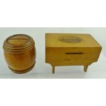 TWO EARLY 20TH CENTURY MAUCHLINE BOXWOOD MONEY BOXES, fashioned as a barrel and a table