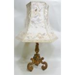 AN ITALIAN ORMOLU TABLE LAMP, acanthus leaf decorated stem on three scroll supports, 50cm high