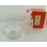 A LEAD CRYSTAL SQUARE CUT SPIRIT DECANTER with ball facet stopper and a lead crystal FRUIT BOWL,