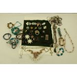 A SELECTION OF COSTUME JEWELLERY to include approximately seventeen necklets, and approximately