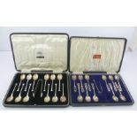 COOPER BROS. A SET OF TWELVE SEAL TERMINAL SILVER COFFEE SPOONS Sheffield 1936, 110g with a pair