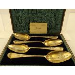 ELEY & FEARN A SUITE OF FOUR GEORGE III SILVER GILT FRUITED SPOONS, each having relief applied