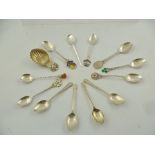 A MIXED LOT comprising a silver scallop shell pattern silver caddy spoon, Birmingham 1987, and