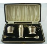 ADIE BROS. A SILVER DECO STYLE THREE-PIECE SILVER CONDIMENT, having banded decoration and two