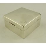 A AND J ZIMMERMAN LTD. AN EARLY 20TH CENTURY SILVER CIGARETTE BOX having hinged cover monogrammed "