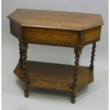 A VINERS OF SHEFFIELD SILVER PLATED CANTEEN in an oak hinged lid table cabinet on barley twist