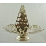 A 20TH CENTURY FOREIGN SILVER COLOURED METAL FRUIT BASKET, having fretted decorated up-over handle