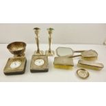 TWO SILVER MOUNTED GOLIATH NICKEL CASED DRESSING TABLE TIME PIECES each having eight day keyless