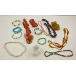 A SELECTION OF VARIOUS BEAD NECKLACES & BANGLES