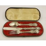 ALEXANDER HUNT OR HADFIELD A THREE PIECE CHILD'S SILVER CHRISTENING SET having hollow filled pressed