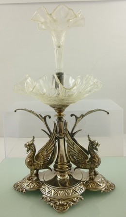 A LATE VICTORIAN EPERGNE silver plated gryphon mounted base, fitted bowl and trumpet flute, 34cm