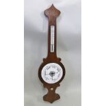 A 19TH CENTURY ROSEWOOD CASED BAROMETER AND THERMOMETER having onion top, opaque glass dial