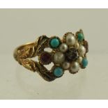 AN EARLY VICTORIAN GEM SET DRESS RING having central period cut diamond, bordered by seed pearls