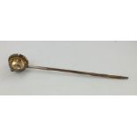 A GEORGIAN SILVER TODDY LADLE having bowl with spout and coin set base and whale bone handle