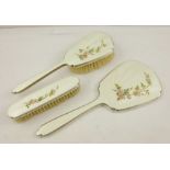 MAPPIN & WEBB A THREE PIECE SILVER DRESSING TABLE SET comprising; hand mirror, clothes brush and