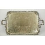 A VICTORIAN ELECTRO-PLATE ON COPPER DRINKS TRAY having cast and applied floral and vine border