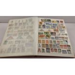 A STOCKBOOK containing many hundreds of world stamps