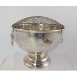 P** LTD. A TRADITIONAL CLASSICALLY STYLED SILVER ROSE BOWL, having base metal wire top, rolled
