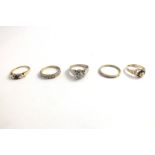 A SELECTION OF FIVE 9CT GOLD AND GOLD COLOURED METAL DRESS RINGS, set with diamonds and sapphires,