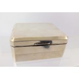 ADIE BROTHERS LTD. A MID 20TH CENTURY SILVER CIGARETTE BOX, of plain form with canted corners, cedar