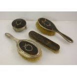FOUR DISSIMILARLY PATTERNED SILVER AND TORTOISESHELL DRESSING TABLE ITEMS, comprising a lidded