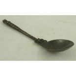 A FOREIGN WHITE METAL PRESENTATION SPOON, dated "31 Jan 1938" with cassocked child terminal