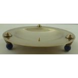 EMILE PUIFORCAT A SILVER PLATED VIDE-POCHE of Art Deco form, having shallow circular bowl