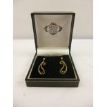 A PAIR OF 9CT GOLD 1970'S DROP EARRINGS, each having a double scroll on butterfly fitting