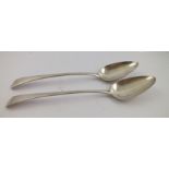 A PAIR OF GEORGE III SILVER BASTING SPOONS, the plain Hanoverian handles monogrammed "M.R.",