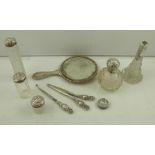 MIXED MAKERS A MATCHED SUITE OF SILVER MOUNTED DRESSING TABLE ITEMS, comprising a hand mirror, scent