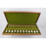 JOHN PINCHES LTD. A SET OF TWELVE "ROYAL HORTICULTURAL SOCIETY" SPONSORED SILVER "FLOWER" TEASPOONS,