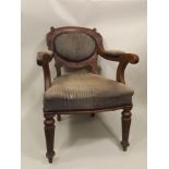 HACK A WILLIAM IV OAK SHOW WOOD DESK/ELBOW CHAIR, having acanthus carved back, upholstered arms