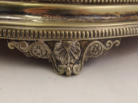 AN OVAL EPNS CAKE STAND, having mirror base, beaded surround, and raised on four cast scroll feet, - Image 2 of 2