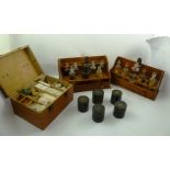 AN EARLY 20TH CENTURY HOME MEDICAL KIT includes; two stands with bottles, box with original