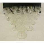 A SUITE OF FIFTEEN LEAD CRYSTAL SUNDAE GLASSES, each richly etched with vines around, spiral slice