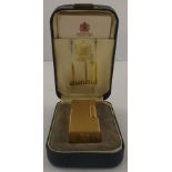 A GOLD PLATED DUNHILL LIGHTER, in original box