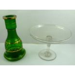 A GLASS COMPORT, small stars cut to the shallow bowl top, on plain stem with circular foot 25cm