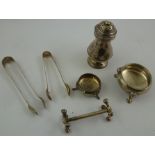 A QUANTITY OF SILVER ITEMS including an 18th century bun pepper (maker worn), two pairs of sugar