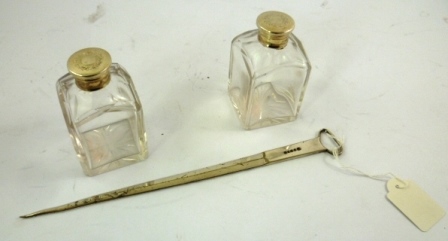 A PAIR OF SQUARE SCENT BOTTLES with facet cut shoulders, glass stoppers and plated caps, 8.5cm high, - Image 3 of 3