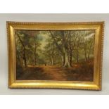 VICTORIAN SCHOOL A lady in red cloak in woodland, oil on canvas, 39cm x 59cm in modern gilt frame