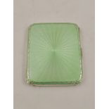 ADIE BROS A SILVER AND GREEN ENAMEL CIGARETTE CASE having engine turned and gilded interior,