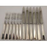 COOPER BROTHERS & SONS LTD. A SET OF GEORGIAN DESIGN DESSERT KNIVES AND FORKS FOR SIX PERSONS,