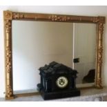 A LATE 19TH CENTURY FRAMED PIER MIRROR, having fluted column sides, with under bracket, 163cm high x