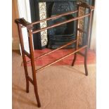 AN EDWARDIAN MAHOGANY TOWEL RAIL, 80cm wide